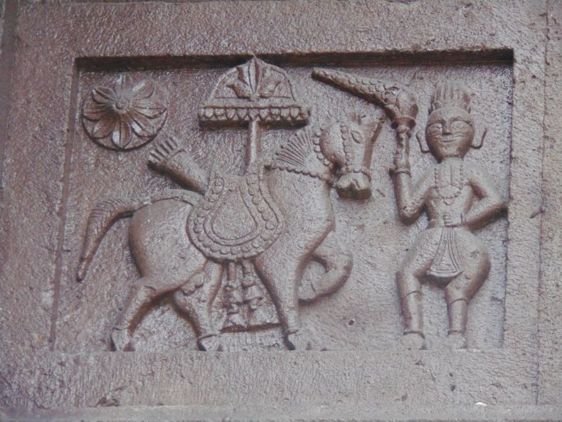 The horse is confronted by a warrior.