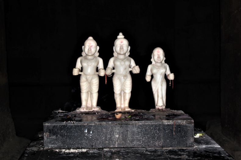 Newly installed marble idols of Rāma, Lakṣmaṇa, and Sītā.