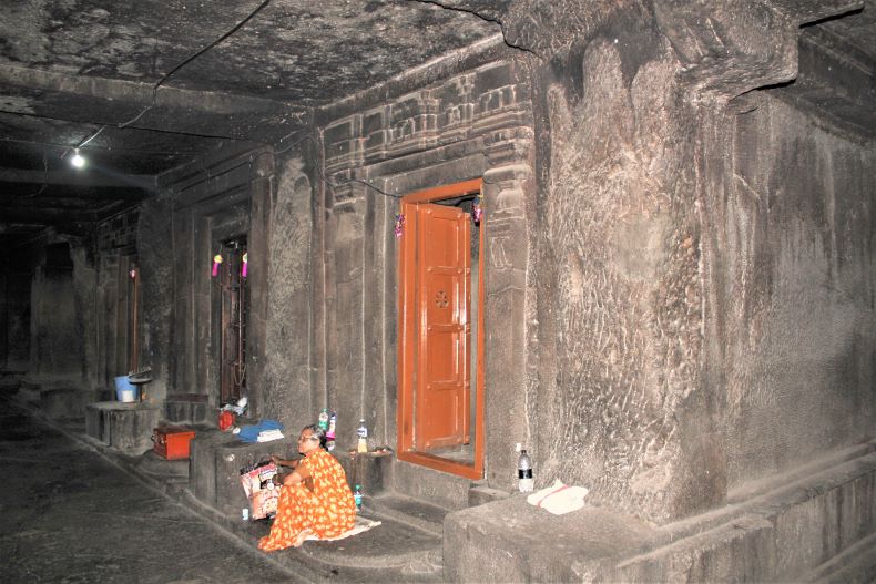 Three rock-cut shrines.