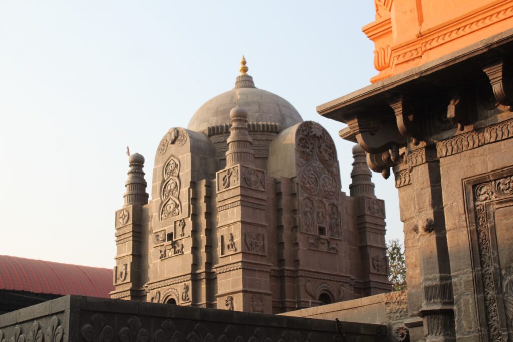 The śikhara on the garbhagṛha.