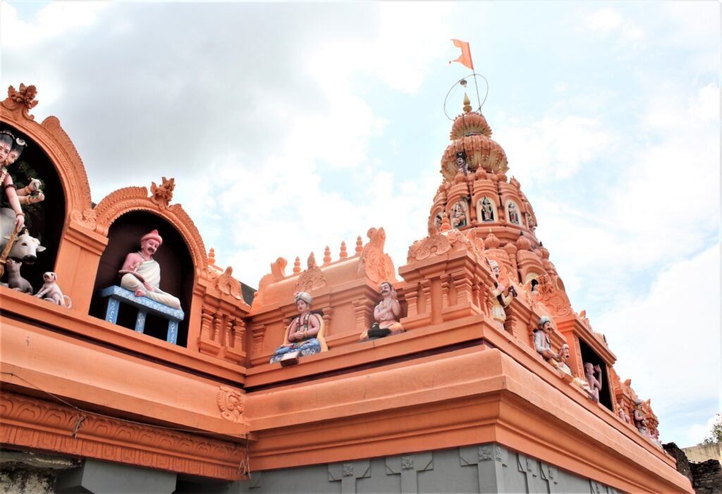 A modern śikhara on the temple.