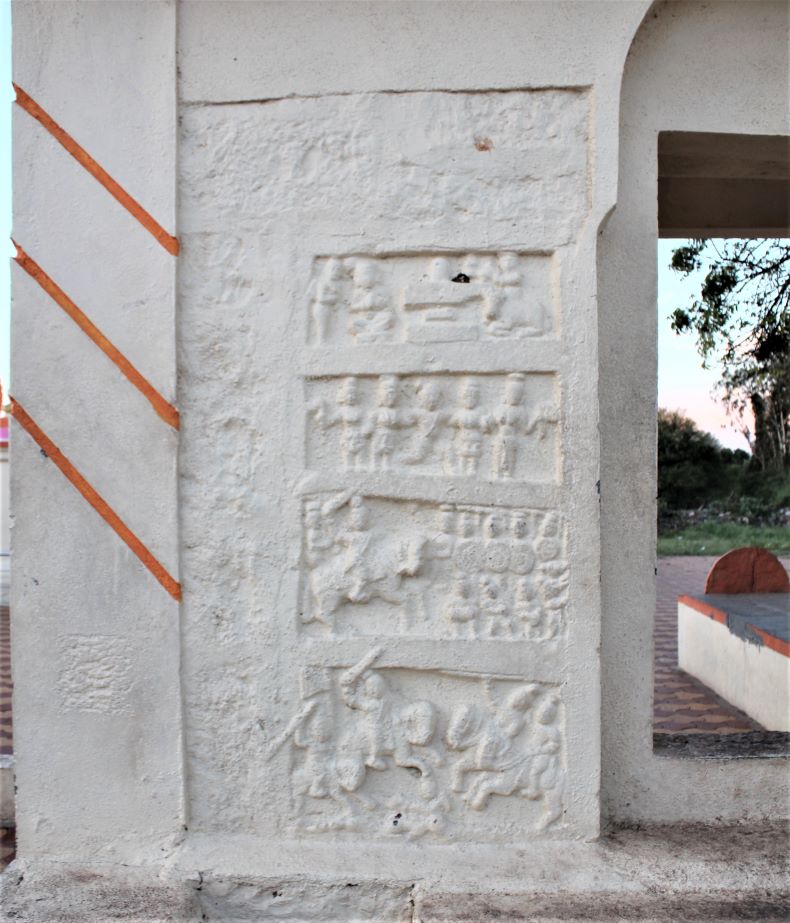 A vīragaḷa embedded in the gateway wall.