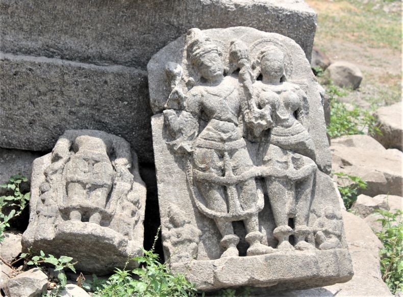 Two isolated sculptures of Vishnu.